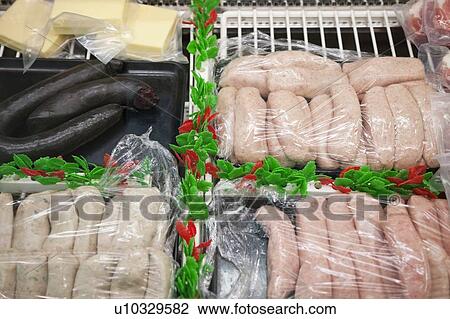 Stock Image - Close-up of sausages for sale. Fotosearch