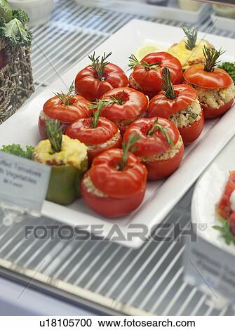 Close-up of stuffed tomatoes in serving dish View Large Photo Image Stock Image - Close-up of stuffed tomatoes in serving dish. Fotosearch