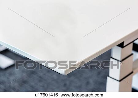 Stock Photograph - Close up of table edge design in office. Fotosearch