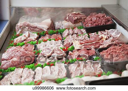 Close-up of trays of meat View Large Photo Image Stock Photograph - Close-up of trays of meat. Fotosearch