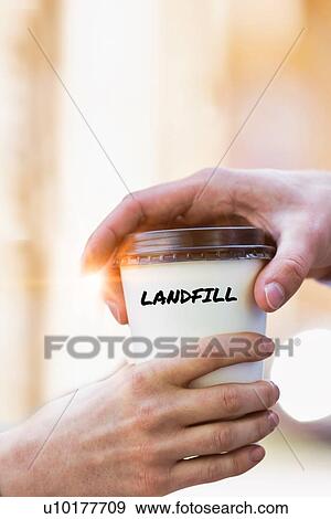 Stock Photo - Close up photo of businesswoman giving businessman a cup of coffee . Fotosearch