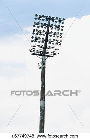 Stock Photo - Close up photo of photo of stadium lights. Fotosearch