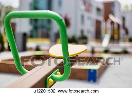 Close up photo of seasaw on playground View Large Photo Image Stock Image - Close up photo of seasaw on playground. Fotosearch