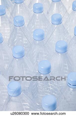 Close-up view of empty plastic bottles with blue caps View Large Photo Image Stock Image - Close-up view of empty plastic bottles with blue caps. Fotosearch