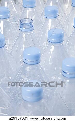 Stock Image - Close-up view of empty plastic bottles. Fotosearch