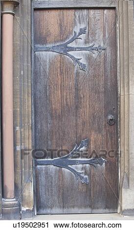 Stock Image - Closed wooden door. Fotosearch