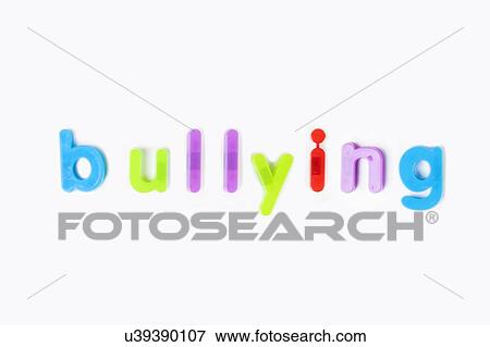 Colorful alphabet magnets spell 'bullying' over white background View Large Photo Image Stock Photo - Colorful alphabet magnets spell 'bullying' over white background. Fotosearch