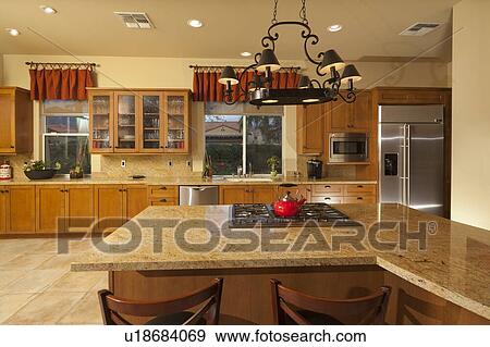 Stock Photo - Combined kitchen dining space. Fotosearch