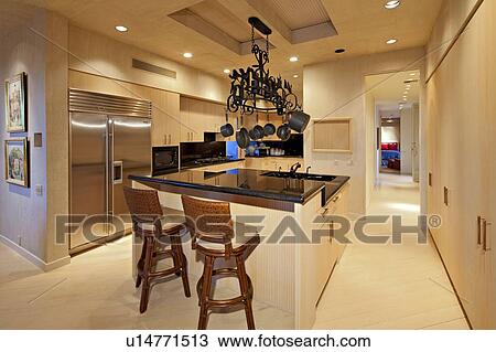 Stock Image - Contemporary kitchen counter in manor house. Fotosearch