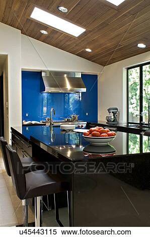 Stock Photography - Contemporary kitchen counter of luxury villa. Fotosearch