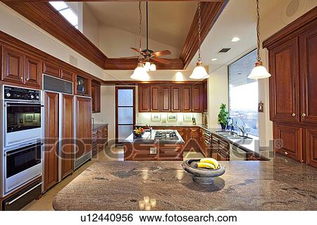 Contemporary kitchen in luxury house View Large Photo Image Stock Photograph - Contemporary kitchen in luxury house. Fotosearch