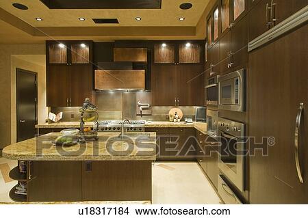 Picture - Contemporary kitchen in luxury residential house. Fotosearch