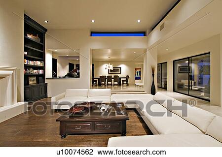 Contemporary living room on hardwood floor in mansion View Large Photo Image Stock Image - Contemporary living room on hardwood floor in mansion. Fotosearch
