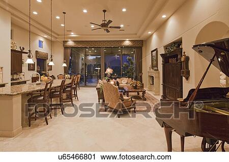 Stock Image - Contemporary mansion with living room and kitchen together. Fotosearch