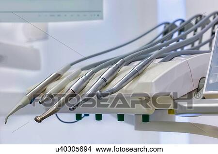 Picture - Dental clinic and dental instruments. Fotosearch