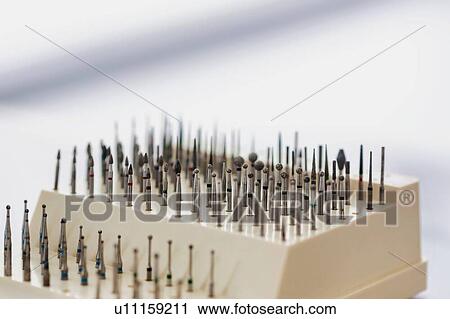 Stock Image - Dental clinic and dental instruments. Fotosearch