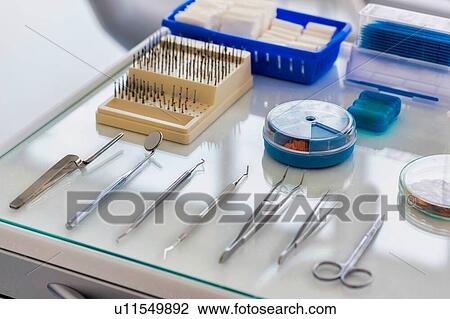 Stock Image - Dental clinic and dental instruments. Fotosearch