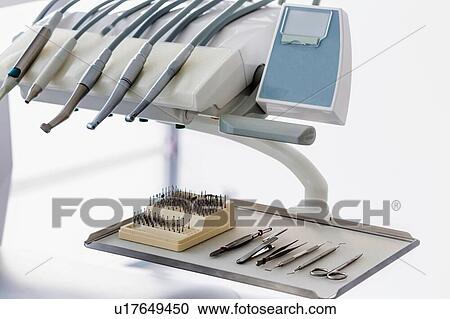Stock Image - Dental clinic and dental instruments. Fotosearch