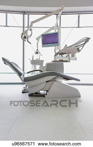 Stock Image - Dental clinic and dental instruments. Fotosearch