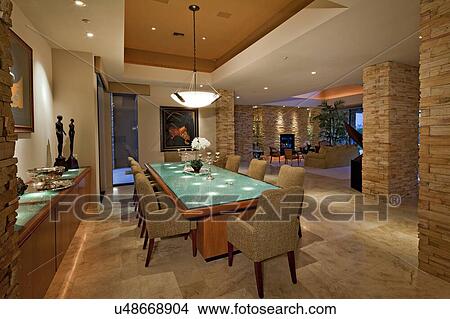 Picture - Dining room with chandelier in luxury mansion. Fotosearch