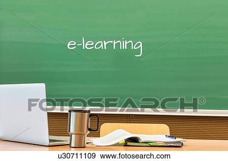 Stock Photo - E-learning written on black board in classroom. Fotosearch