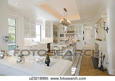 Elegant white kitchen in luxury manor house View Large Photo Image Stock Photography - Elegant white kitchen in luxury manor house. Fotosearch