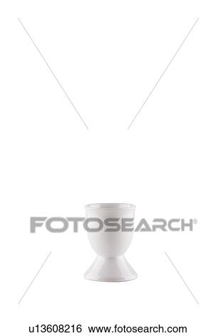 Empty egg cup over white background View Large Photo Image Stock Photograph - Empty egg cup over white background. Fotosearch