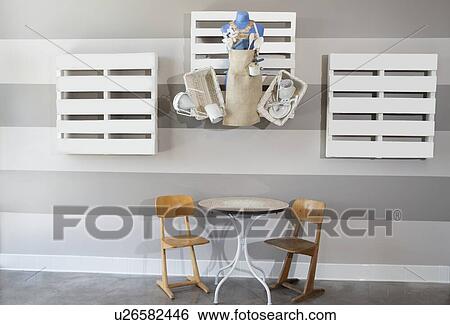 Empty kid's table and chair at cafe View Large Photo Image Stock Photograph - Empty kid's table and chair at cafe. Fotosearch