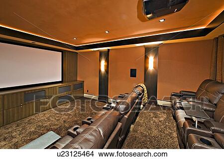 Empty media room with leather furniture in luxury mansion View Large Photo Image Picture - Empty media room with leather furniture in luxury mansion. Fotosearch