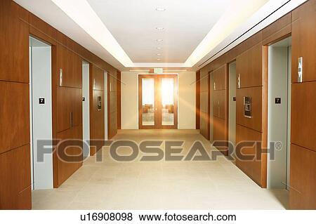 Empty office corridor by elevators on 7th floor of building View Large Photo Image Stock Photo - Empty office corridor by elevators on 7th floor of building. Fotosearch