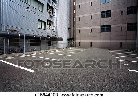 Stock Photo - Empty parking lot. Fotosearch