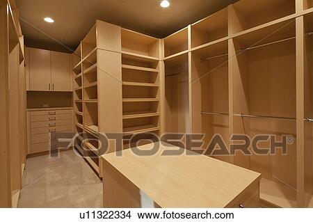Picture - Empty walk in wardrobe. Fotosearch