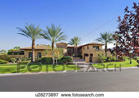 Stock Photo - Facade of luxurious manor house. Fotosearch
