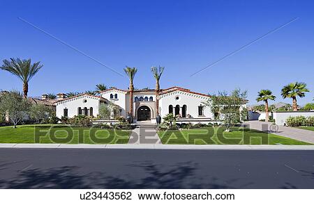 Stock Image - Facade of luxury mansion. Fotosearch