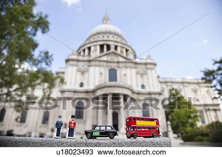 Figurines of London officers and public transports with St. Paul's Cathedral in background View Large Photo Image Stock Image - Figurines of London officers and public transports with St. Paul's Cathedral in background. Fotosearch