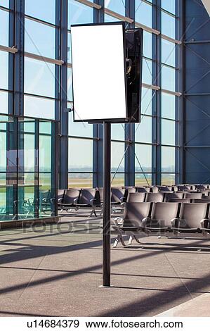Stock Photo - Flight display monitor in airport. Fotosearch