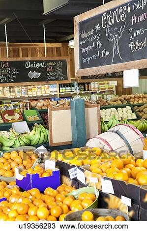 Stock Image - Fresh fruits displayed in market. Fotosearch