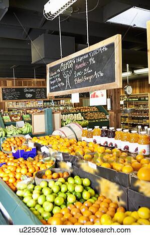 Stock Photo - Fresh fruits stall in market. Fotosearch
