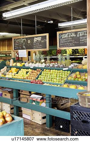 Stock Photo - Fresh fruits stall in supermarket. Fotosearch