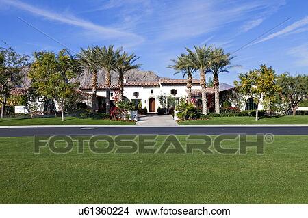 Picture - Front entrance facade of luxury manor house. Fotosearch