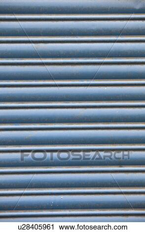 Stock Image - Full frame shot of blue shutter. Fotosearch