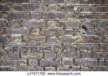 Full frame shot of decayed brick wall View Large Photo Image Stock Image - Full frame shot of decayed brick wall. Fotosearch