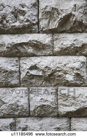 Stock Photograph - Full frame shot of stone wall. Fotosearch