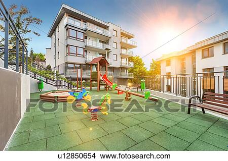 Picture - Full length view of rental apartment business. Fotosearch