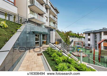 Picture - Full length view of rental apartment business. Fotosearch