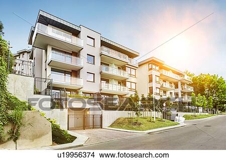 Picture - Full length view of rental apartment business. Fotosearch