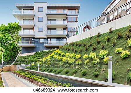 Picture - Full length view of rental apartment business. Fotosearch