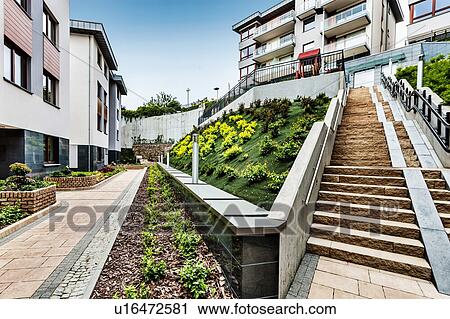 Stock Image - Full length view of rental apartment business. Fotosearch