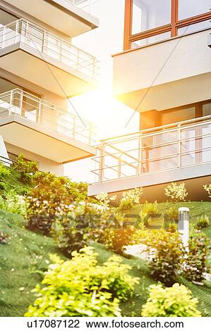 Stock Image - Full length view of rental apartment business. Fotosearch