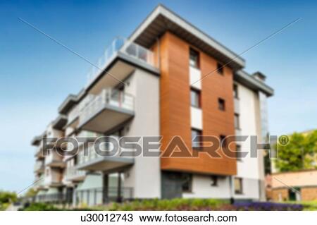 Stock Image - Full length view of rental apartment business. Fotosearch